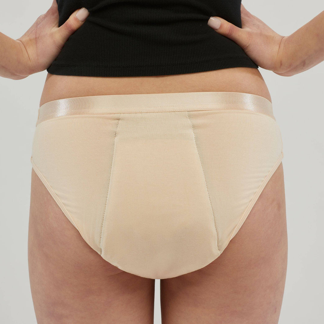 Staydry women's hipster briefs in skin tone, designed for continence, with comfortable fit and discreet coverage.