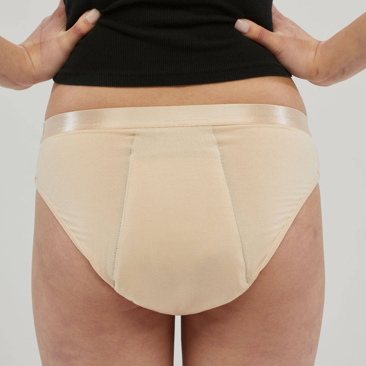 Staydry women's hipster briefs in skin tone, designed for continence, with comfortable fit and discreet coverage.