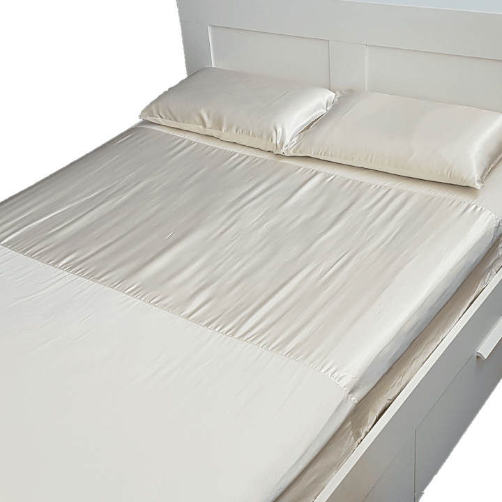 Soft Manchester Wonder Sheet by Neeki Designs, featuring a cozy, textured cream fabric perfect for comfortable bedding.