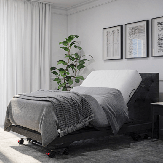Aidacare ASPIRE ComfiMotion Activ Care UltraLow Bed in Portobello Grey, long double size with adjustable side rails and mattress platform.
