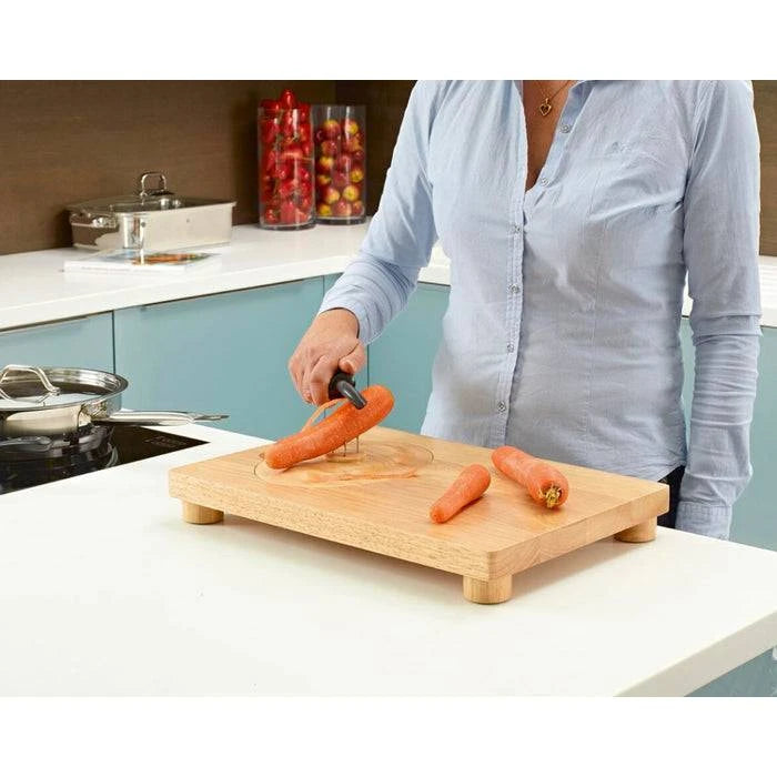 Performance Health multi-purpose food preparation board with a peel-resistant surface, ideal for kitchen prep and accessories.