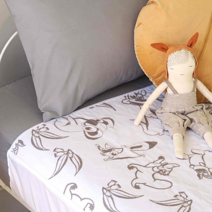Conni Kids Bed Pad with Tuck-ins featuring Aussie Animals design, ideal for children's bedding and nighttime protection.
