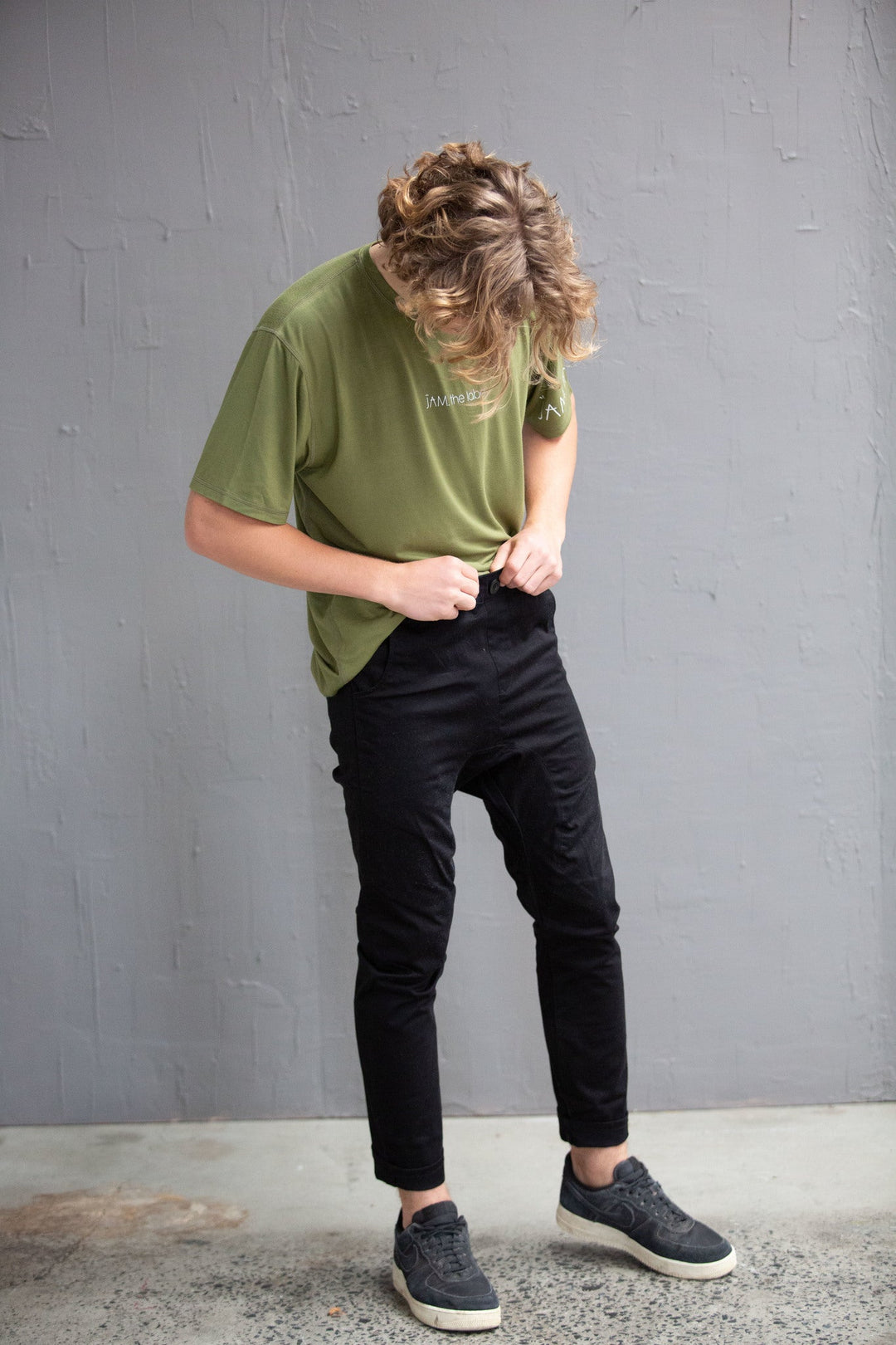 JAM the Label chino pant in dark color, showcasing a stylish, casual clothing design with a comfortable fit.