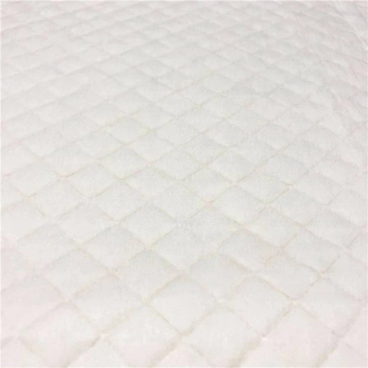 Brolly Disposable Bed Pad 60cm x 90cm, featuring a protective layer for continence care on a bed surface.