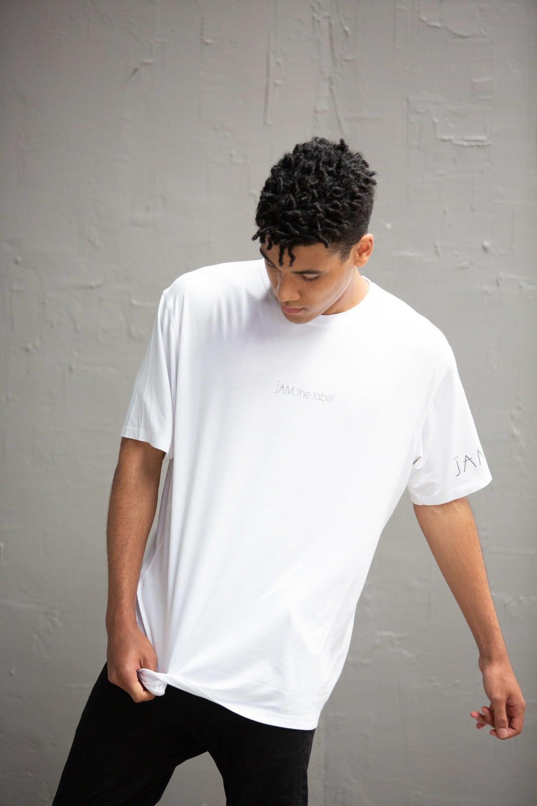 White crew tee from JAM the Label, featuring a classic design and soft fabric, perfect for casual wear.