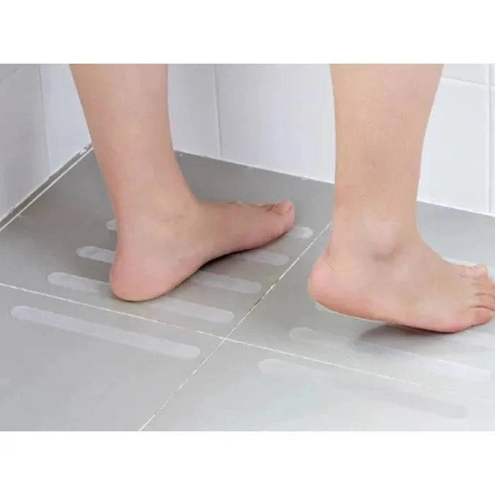 Performance Health GripGuard 30 anti-slip strips shown on shower surface for enhanced safety and grip.