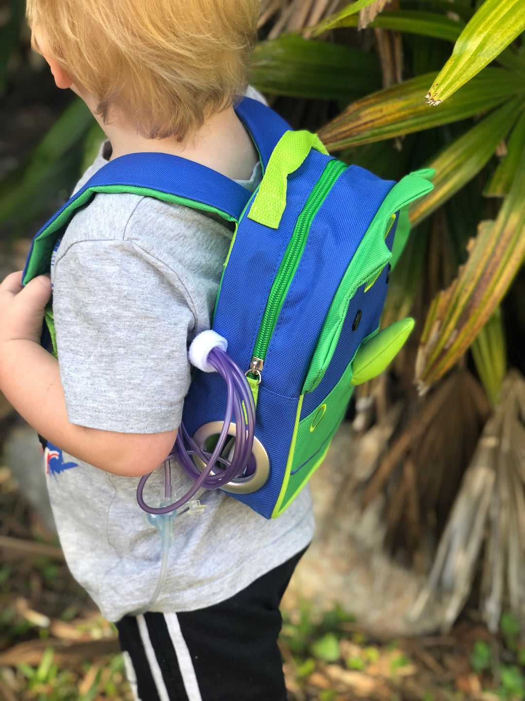 Tubie Fun Small Modified Backpack for nutrition, featuring adjustable straps and colorful design, ideal for medical needs.