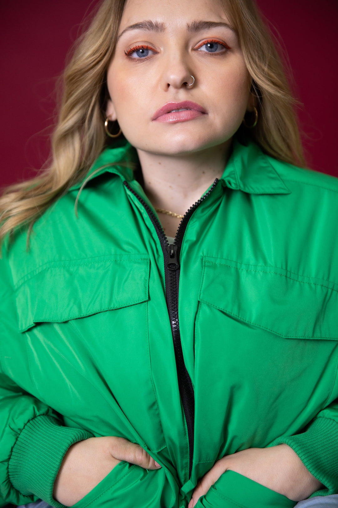 Close-up of JAM the Label Magnetic Zip Bomber Jacket, showcasing the sleek design and magnetic zipper details.