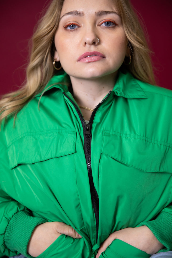 Close-up of JAM the Label Magnetic Zip Bomber Jacket, showcasing the sleek design and magnetic zipper details.