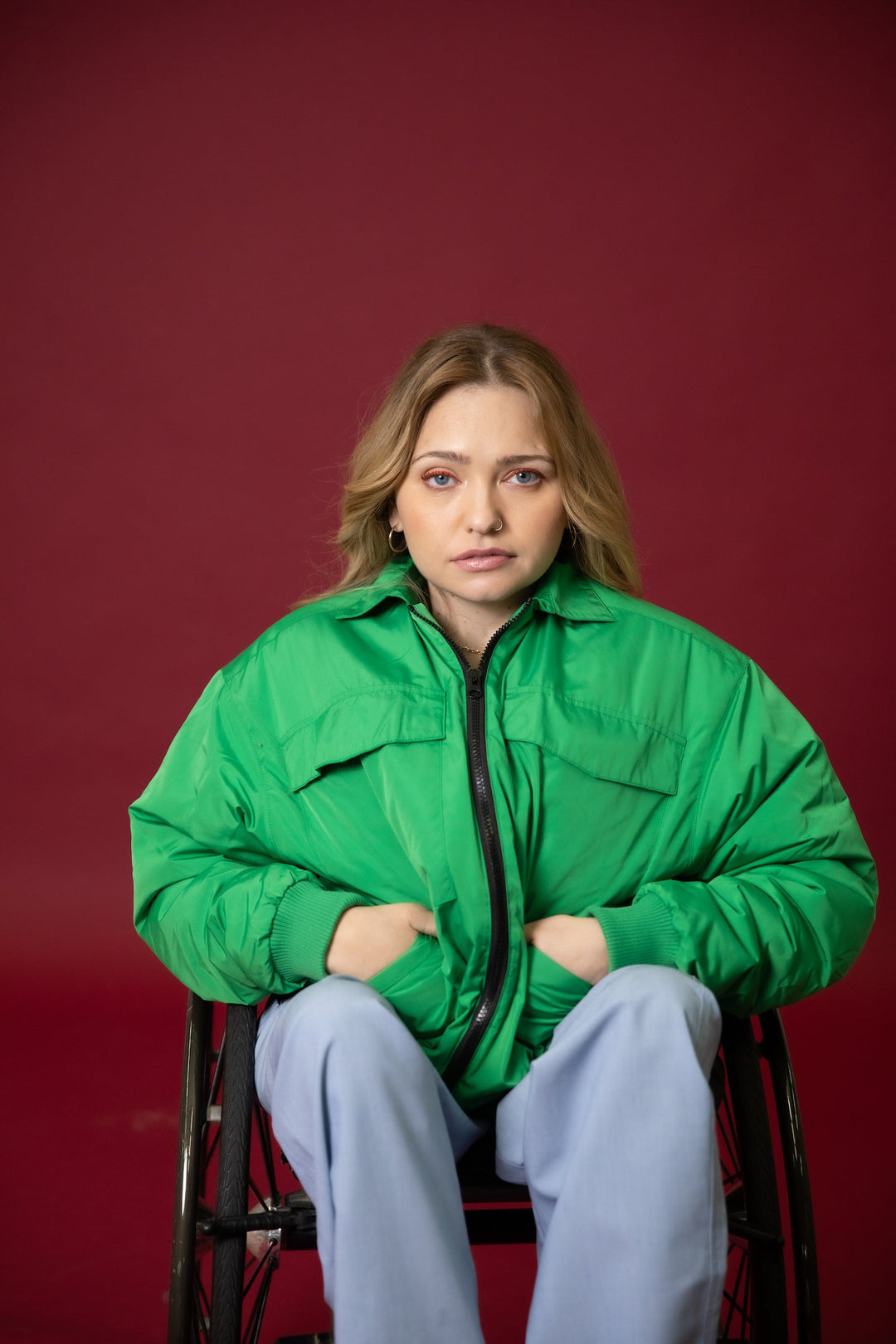 JAM the Label Magnetic Zip Bomber Jacket in a seated front view with the zipper fully closed.