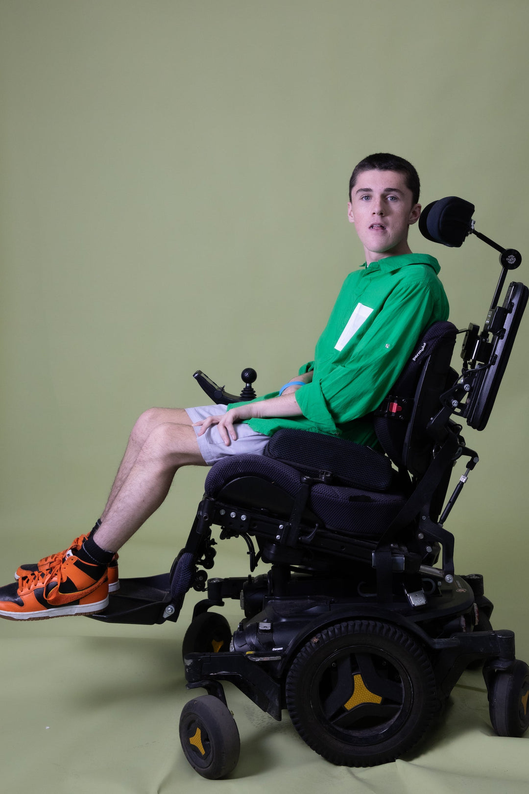 JAM the Label green magnetic long sleeve shirt displayed on a model, showcasing its relaxed fit and sleek design.