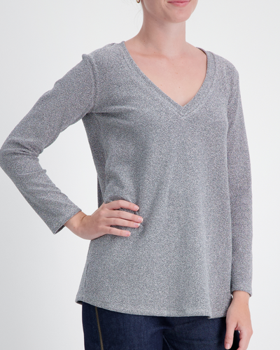 Karni Glitter Top shown in elegant silver metallic finish with v-neckline and long sleeves, featuring a relaxed fit silhouette against white background. The adaptive evening wear top sparkles with a subtle shimmer effect, demonstrating its sophisticated party-ready design.