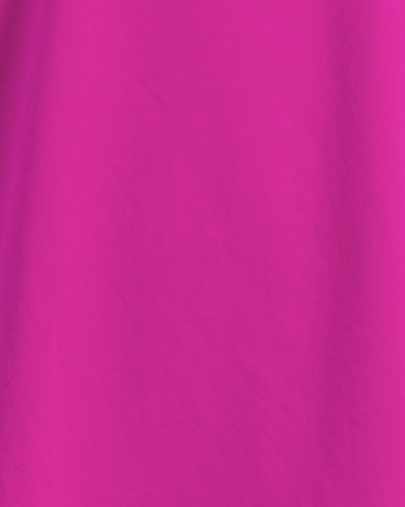 Nick A-Line Tee shown in vibrant magenta color, displaying the spill-free tech fabric&