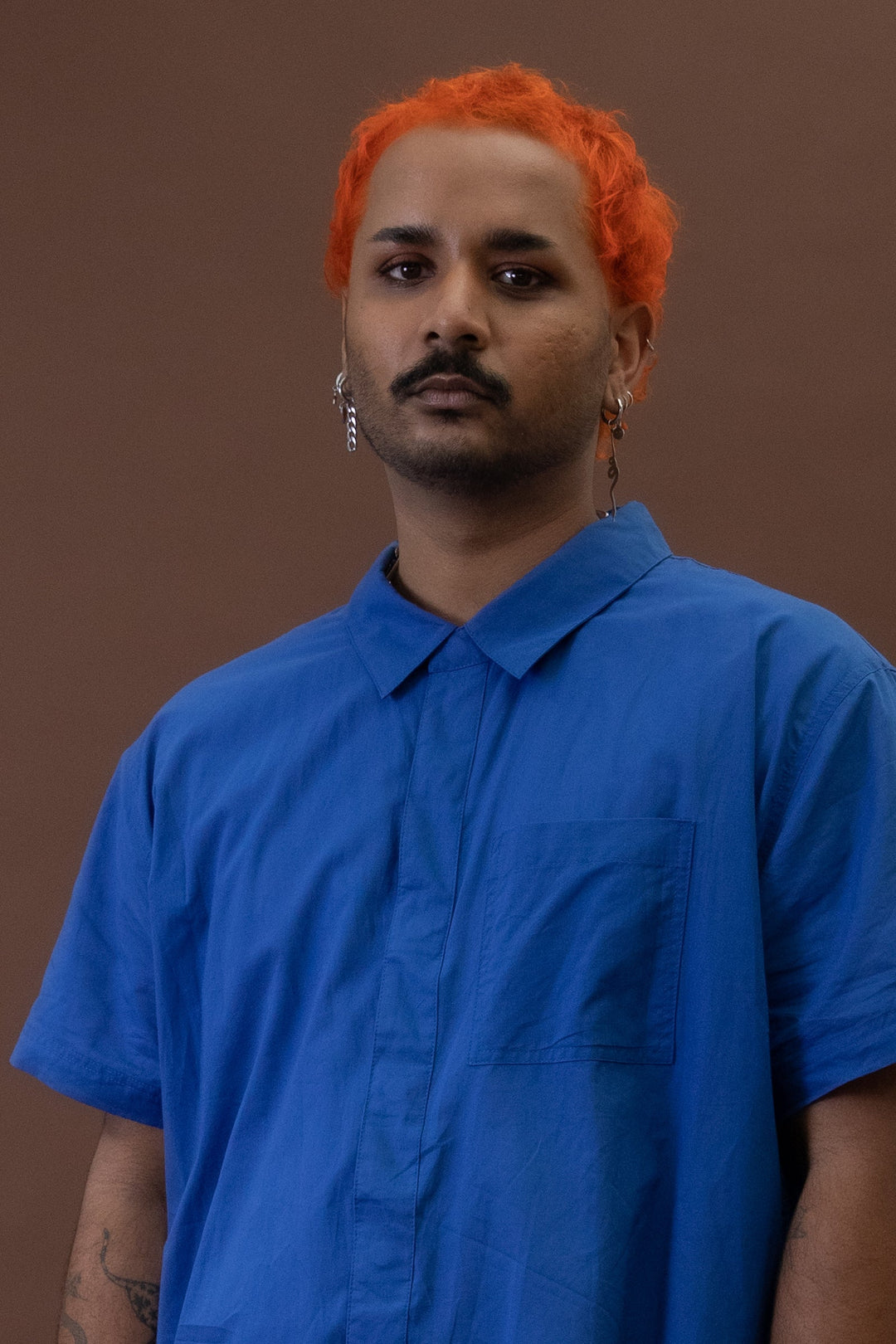 Cobalt JAM the Label short sleeve shirt featuring a magnetic closure, displayed in a close-up.