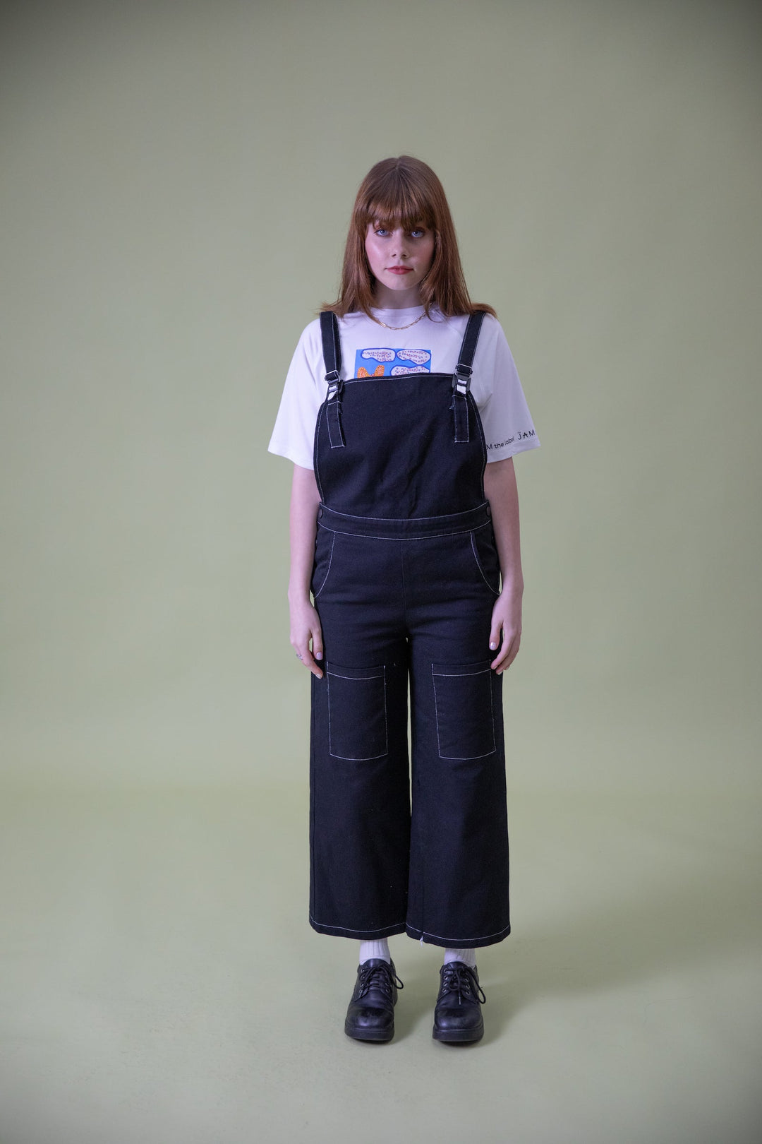 JAM the Label magnetic buckle overalls worn by a person standing front view, featuring adjustable straps and front pockets.