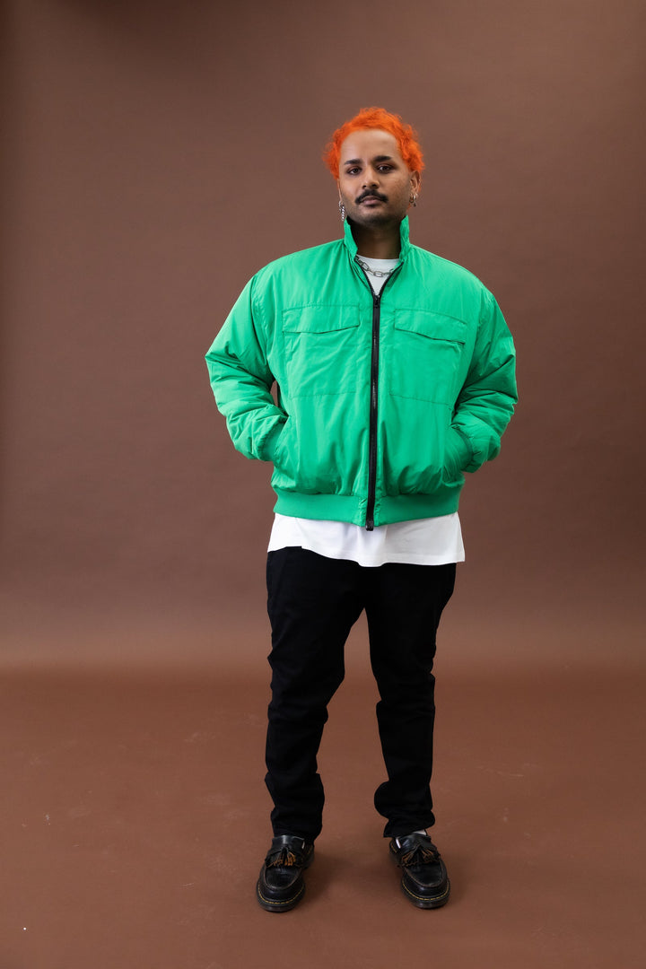 JAM the Label Magnetic Zip Bomber Jacket in front view with collar up, showcasing a stylish, modern design.