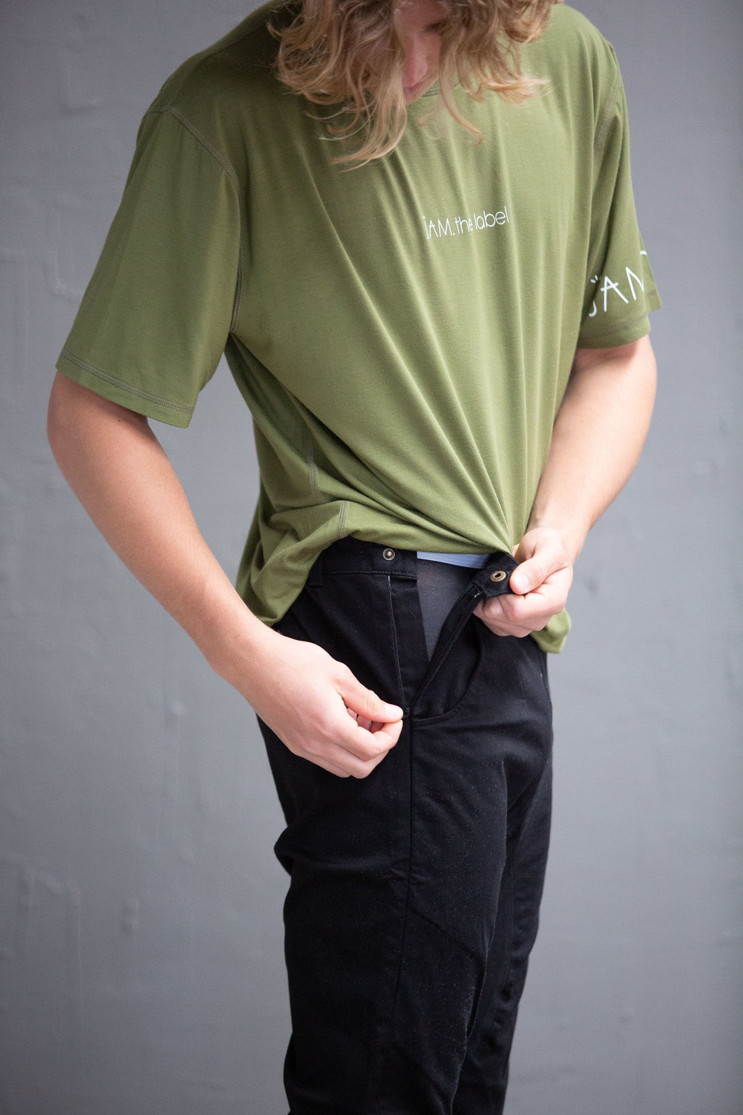 JAM the Label Chino Pant in a stylish standing pose, showcasing the fabric and cut of the clothing.