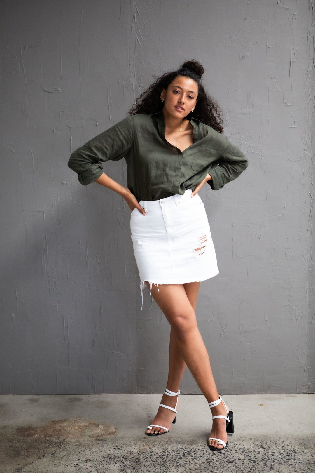 Olive green linen shirt from JAM the Label, featuring a relaxed fit and button-down collar.