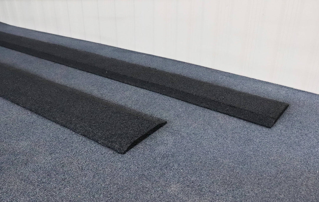 Tyrex recycled rubber shower ramp in black and grey for improved accessibility, measuring 1600mm x 1200mm.