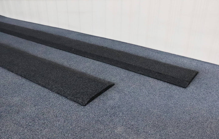 Tyrex recycled rubber shower ramp in black and grey for improved accessibility, measuring 1600mm x 1200mm.