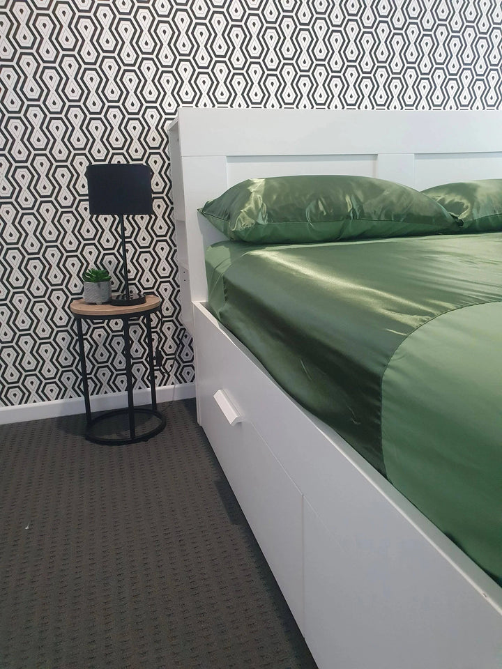 Neeki Designs Wonder Sheet Manchester in green, soft and cozy bedding fabric displayed in the image.