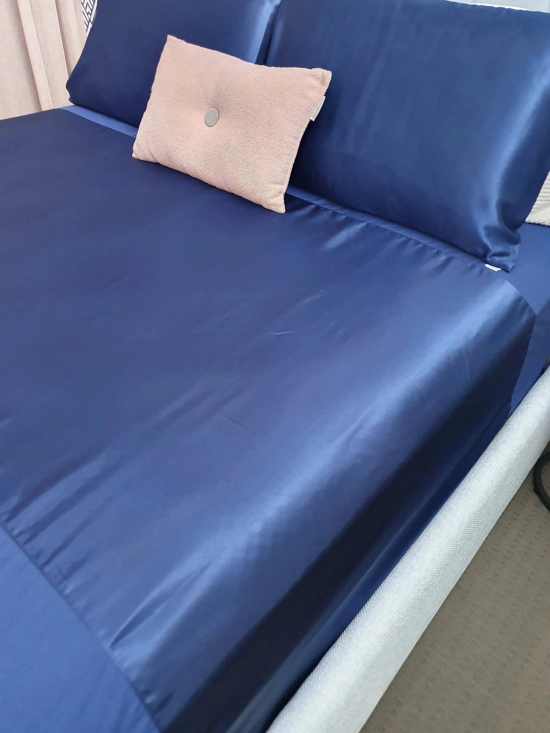 Blue Manchester Wonder Sheet by Neeki Designs, soft and comfortable bed sheet with a smooth fabric texture.