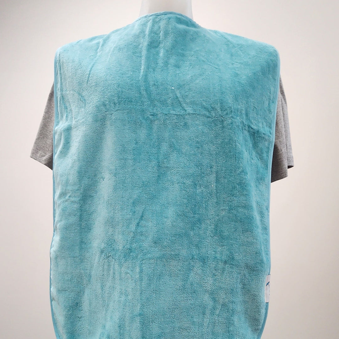 Adult Brolly Extra Absorbent Bib from Brolly Sheets, adaptive clothing, showing soft, waterproof fabric with adjustable neck closure.
