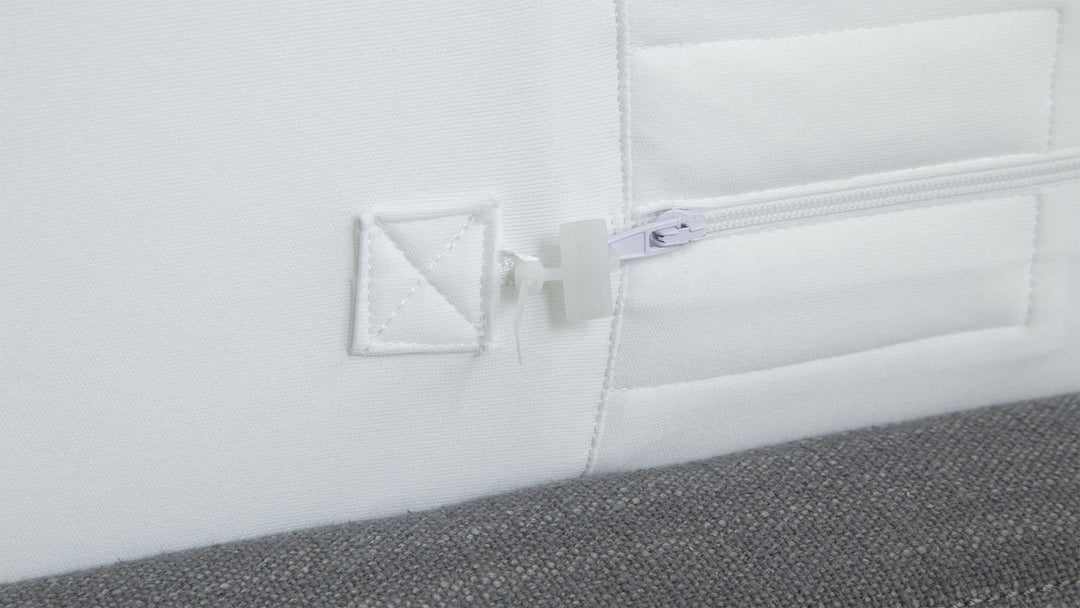 Close-up of Protect-A-Bed Allerzip Manchester mattress protector with zipper closure, showing its durable fabric and seamless fit.