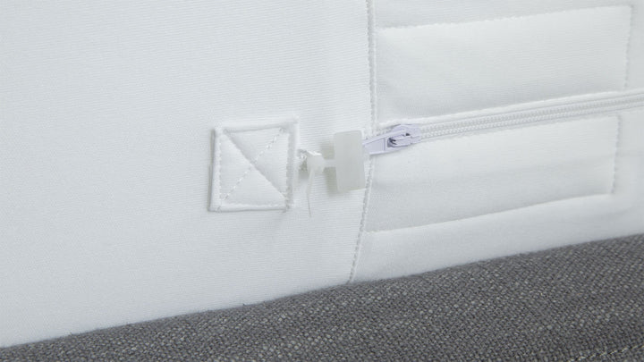 Close-up of Protect-A-Bed Allerzip Manchester mattress protector with zipper closure, showing its durable fabric and seamless fit.