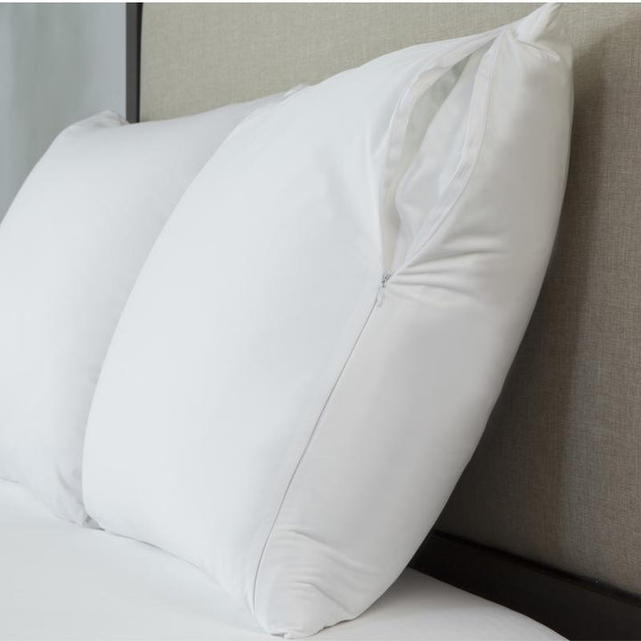 Protect-A-Bed Allerzip fully encased pillow protector in white with zipper, designed for allergy protection and breathable comfort.