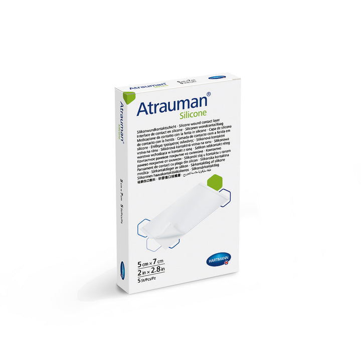 Molicare Atrauman Silicone wound care dressing packaged in a 5x7 inch size, showing texture and design details.