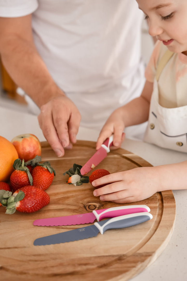 KiddiKutter® accessories, colorful safety scissors with rounded tips, designed for children to cut safely.