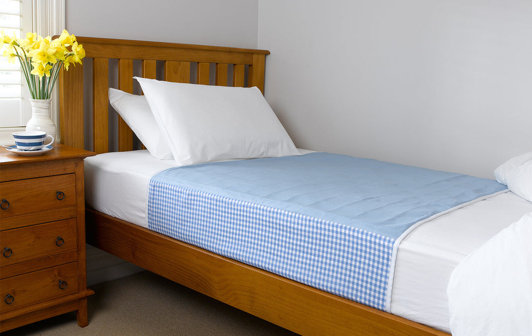 Brolly Sheets blue bed pad with wings for king single beds, ideal for adults and providing extra protection.