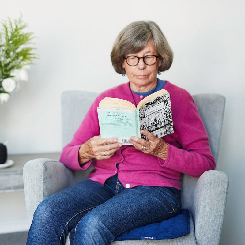 Elderly lady sit on Washable And Absorbent Chair Pads