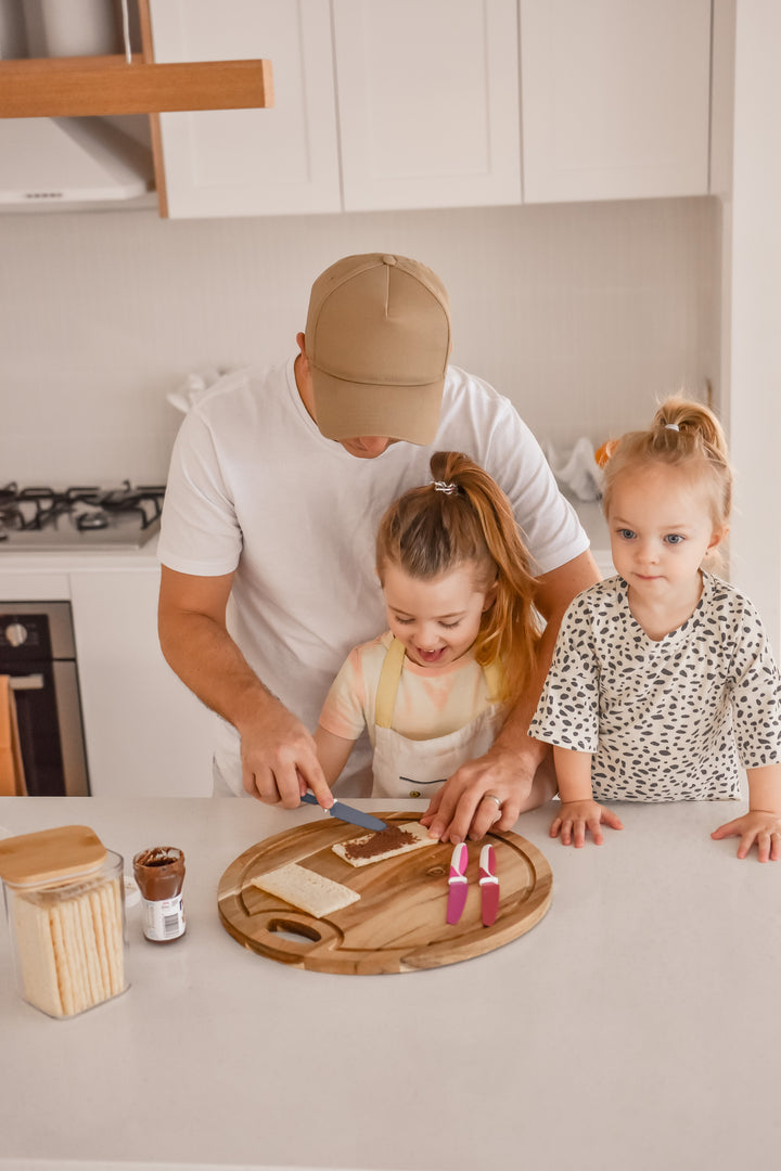 KiddiKutter® accessories shown, featuring colorful safety knife attachments for children’s cutting practice.
