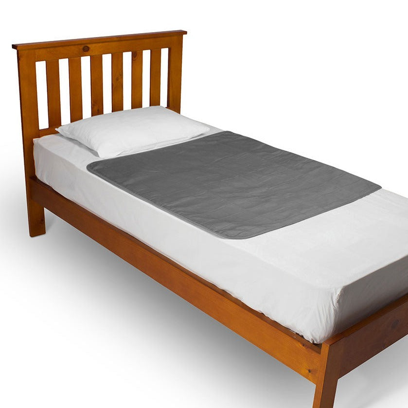 Grey Manchester Brolly Bed Pad without wings from Brolly Sheets, absorbent and waterproof for comfortable sleep.