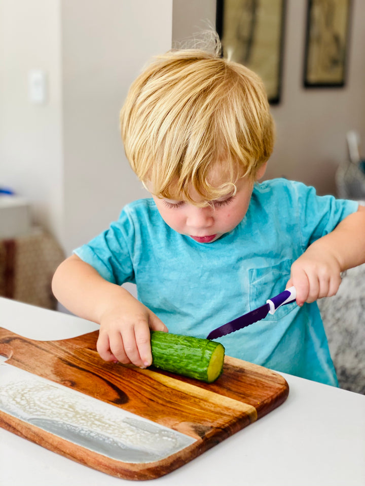 KiddiKutter accessories featuring colorful, child-safe utensils and tools designed for safe, fun food preparation for kids.