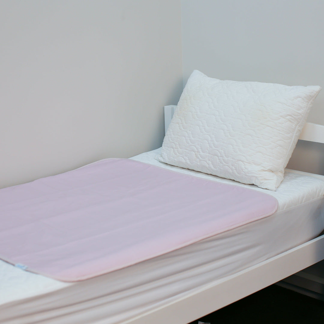 Manchester Brolly Bed Pad without wings from Brolly Sheets, soft absorbent fabric for bed protection.