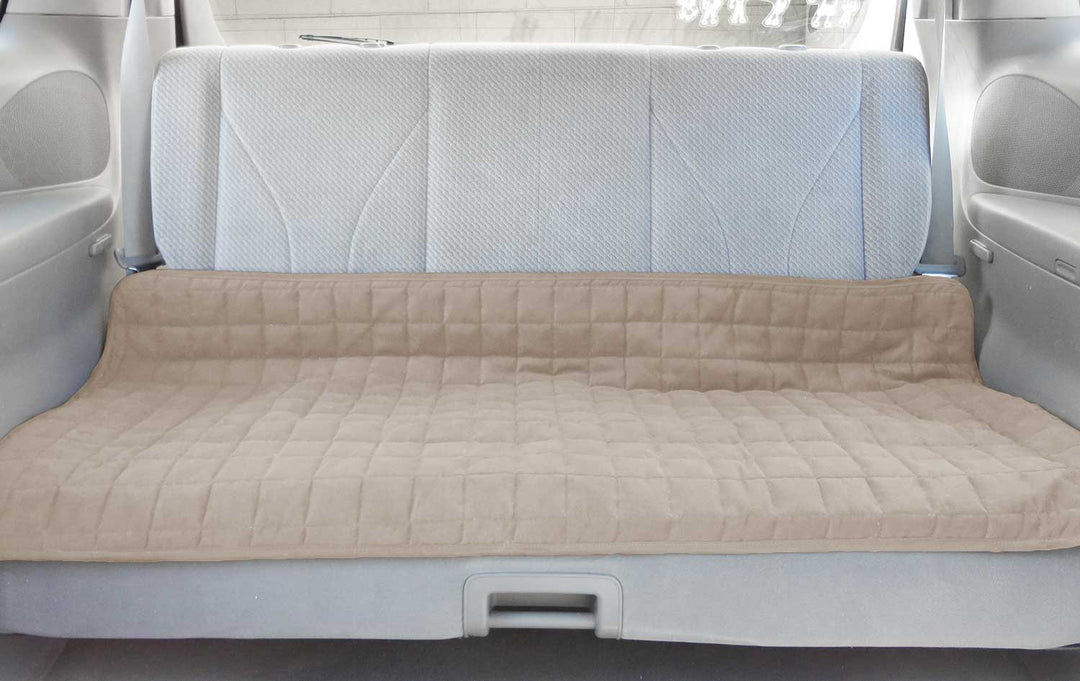 Beige waterproof Brolly Sheets seat protector for car backseat, 120cm by 60cm, protecting large car seats from spills and dirt.