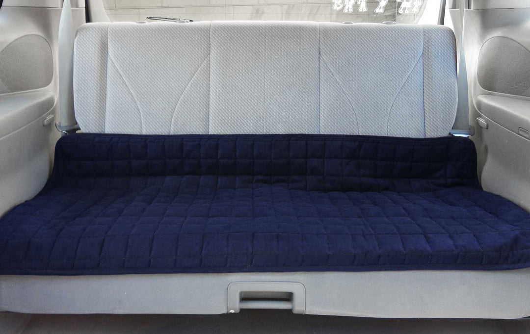Large blue Brolly Sheets seat protector, waterproof, fits backseat, measuring 120cm x 60cm.