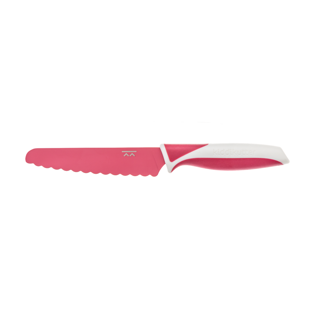 KiddiKutter accessories in pink with colorful dust design, featuring safety features for children&