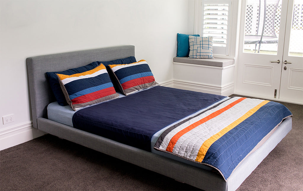 Navy Brolly Sheets bed pad with wings for double, queen, and king size beds, Manchester brand, soft waterproof protection