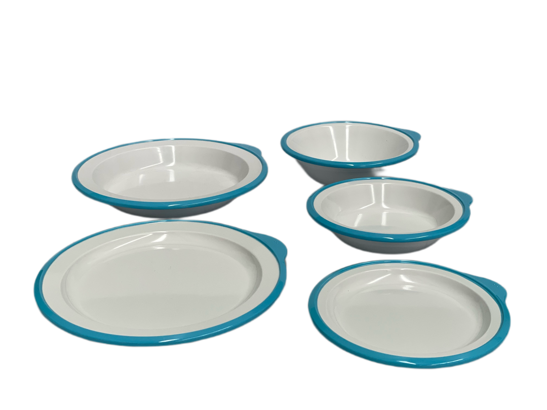 Blue Omni 5-piece adaptive dining ware kit by Euroswift, including plates, bowls, and utensils designed for accessibility.