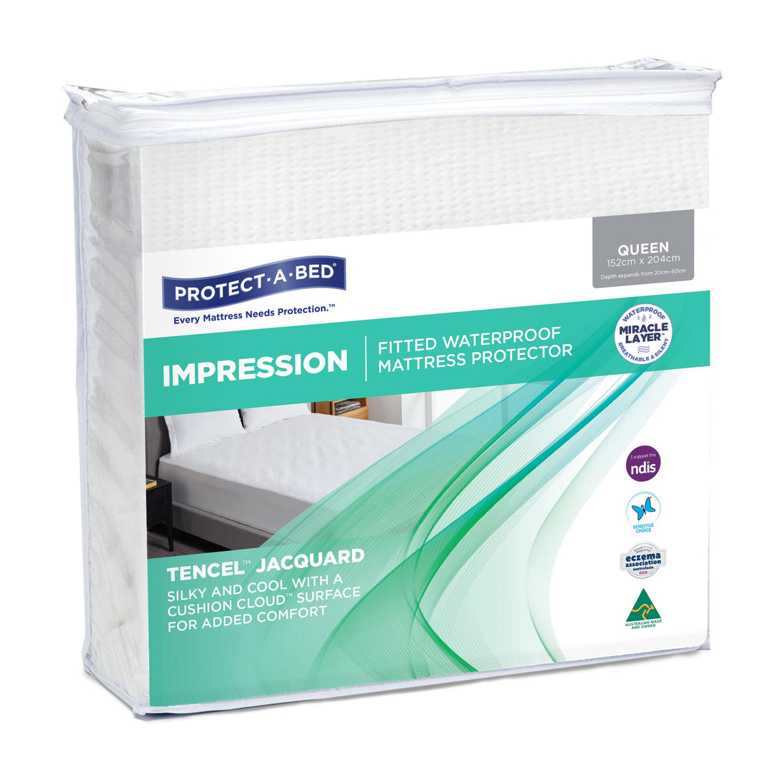 Protect-A-Bed Impression Tencel Jacquard mattress protector on a bed, showcasing its elegant fabric and snug fit.
