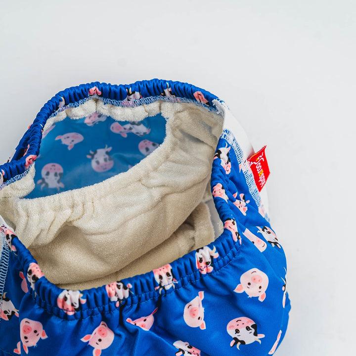 Kidsaroo No Worries Undies featuring playful pig and cow pocket designs for comfortable continence wear for kids.
