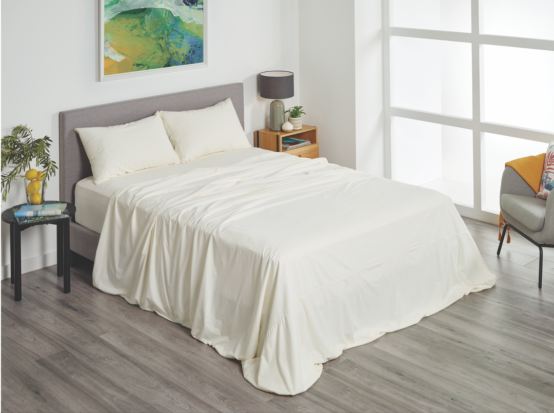 SleepCorp® Protect-A-Bed® Fusion waterproof sheet set in soft fabric, showcasing fitted and flat sheets and pillowcases.