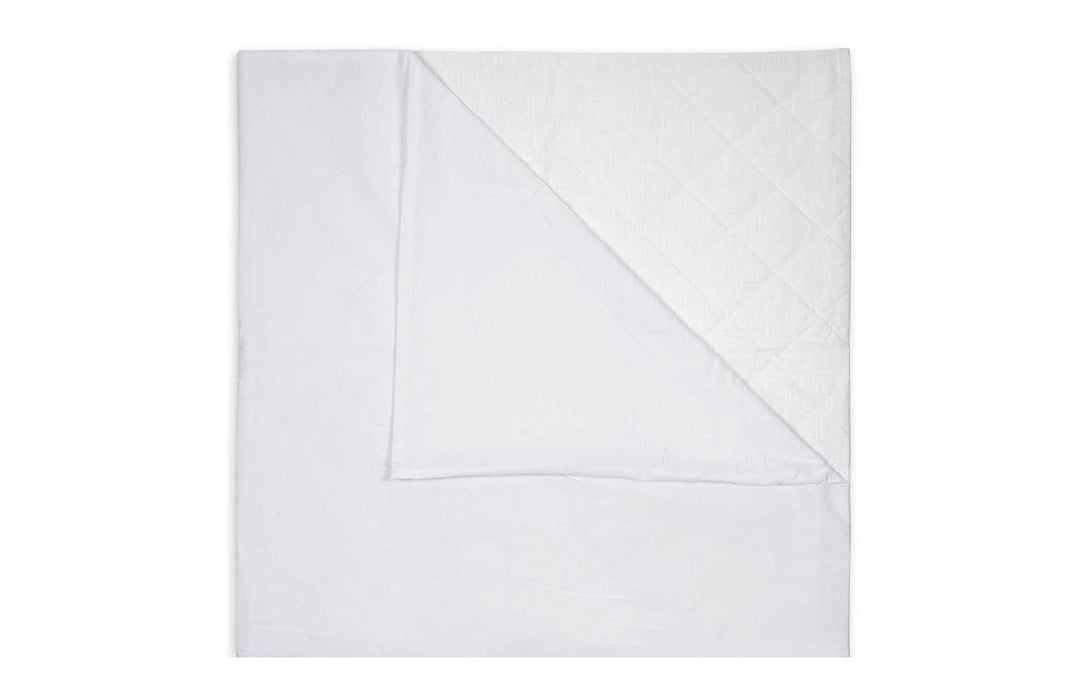 Close-up of Brolly Sheets waterproof quilted kids sleeping bag liner, showing white fabric and detailed stitching.