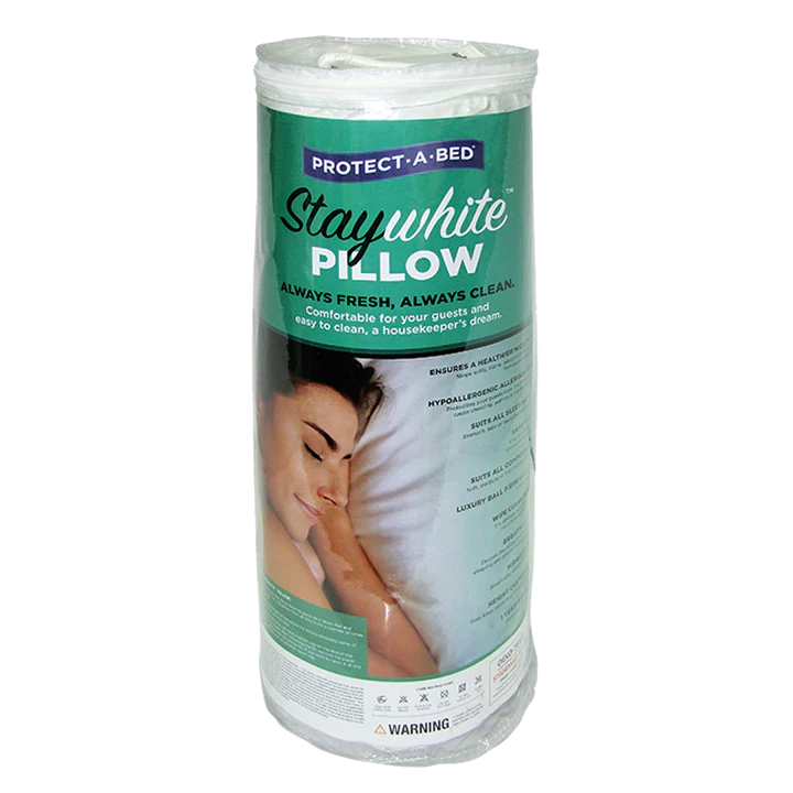Protect-A-Bed Staywhite™ Manchester pillow in packaging, showcasing a white pillow with protective cover for bedding comfort and hygiene.