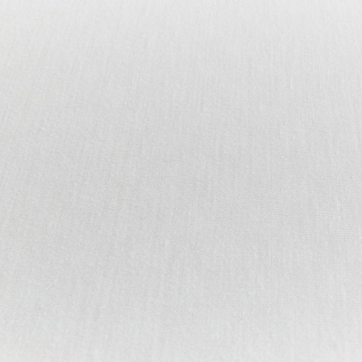 Protect-A-Bed® Harmony waterproof fitted sheet protector made of soft Tencel fabric, showing its snug fit on a mattress.