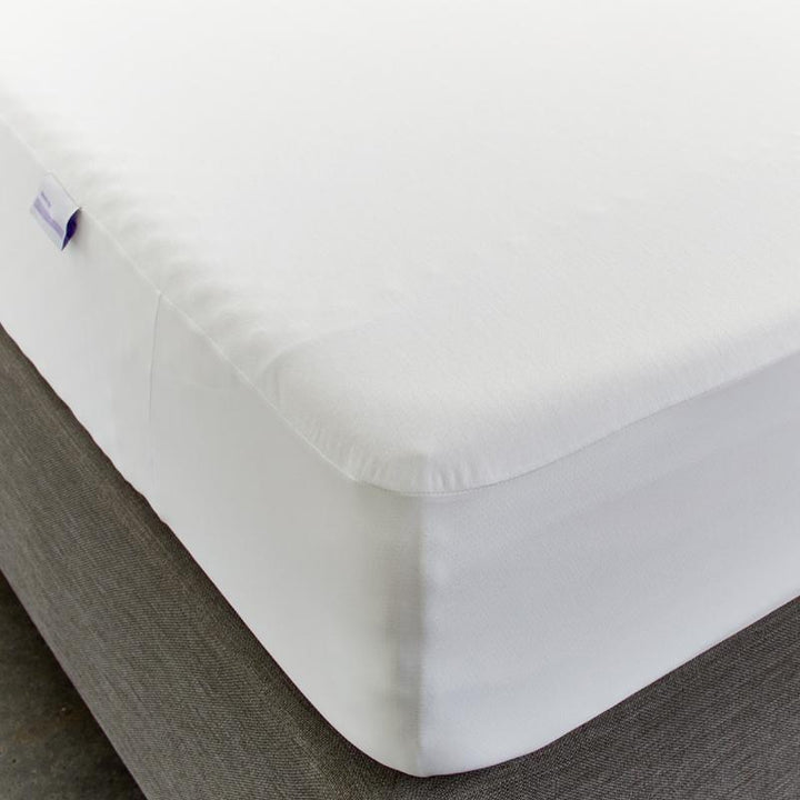 Protect-A-Bed Harmony waterproof Tencel fitted sheet protector on a mattress, showcasing soft, breathable fabric and secure fit.